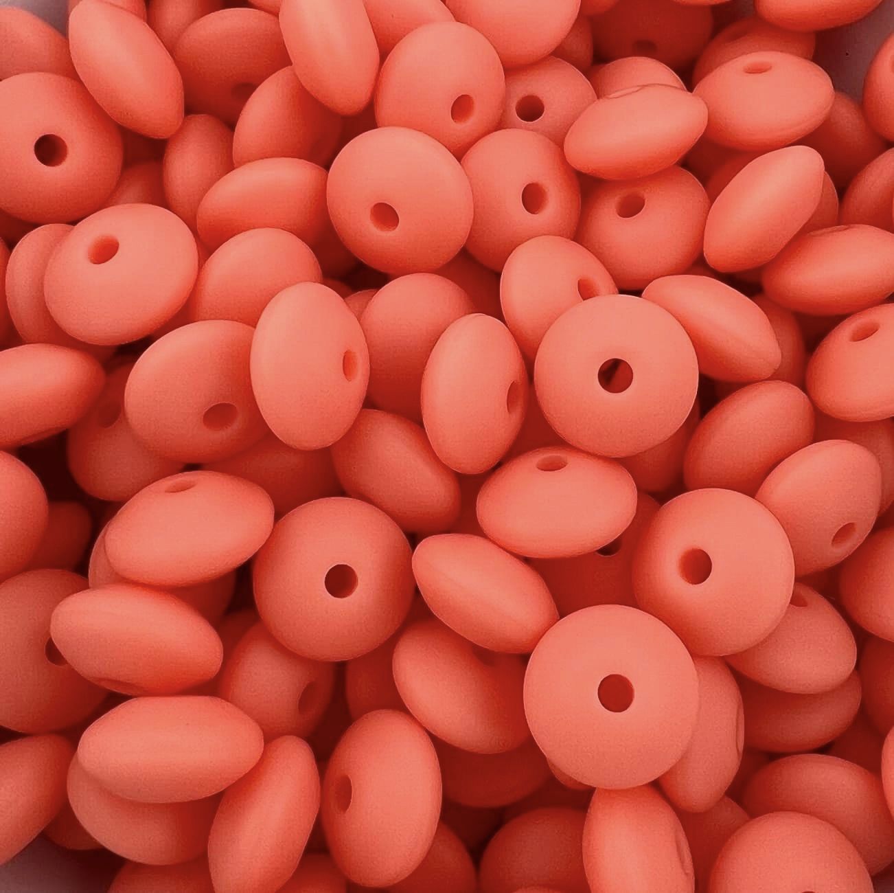Bag of 100 12mm Salmon Solid Silicone Lentil Beads