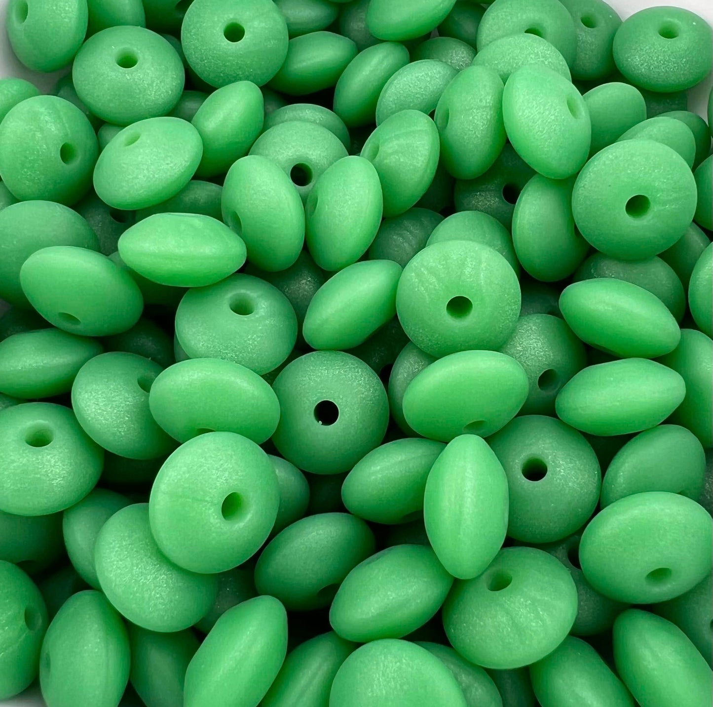 Bag of 100 12mm Pearl Green Solid Silicone Lentil Beads