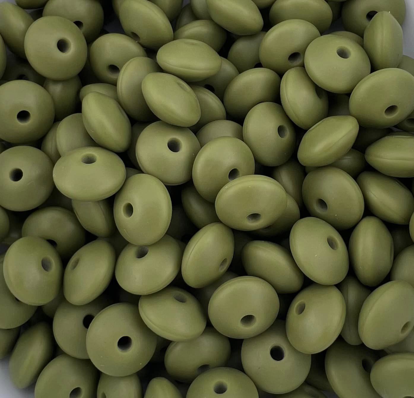 Bag of 100 12mm Crocodile Solid Silicone Lentil Beads