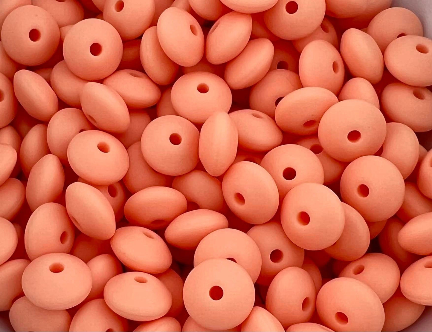 Bag of 100 12mm Peach Sherbet Solid Silicone Lentil Beads