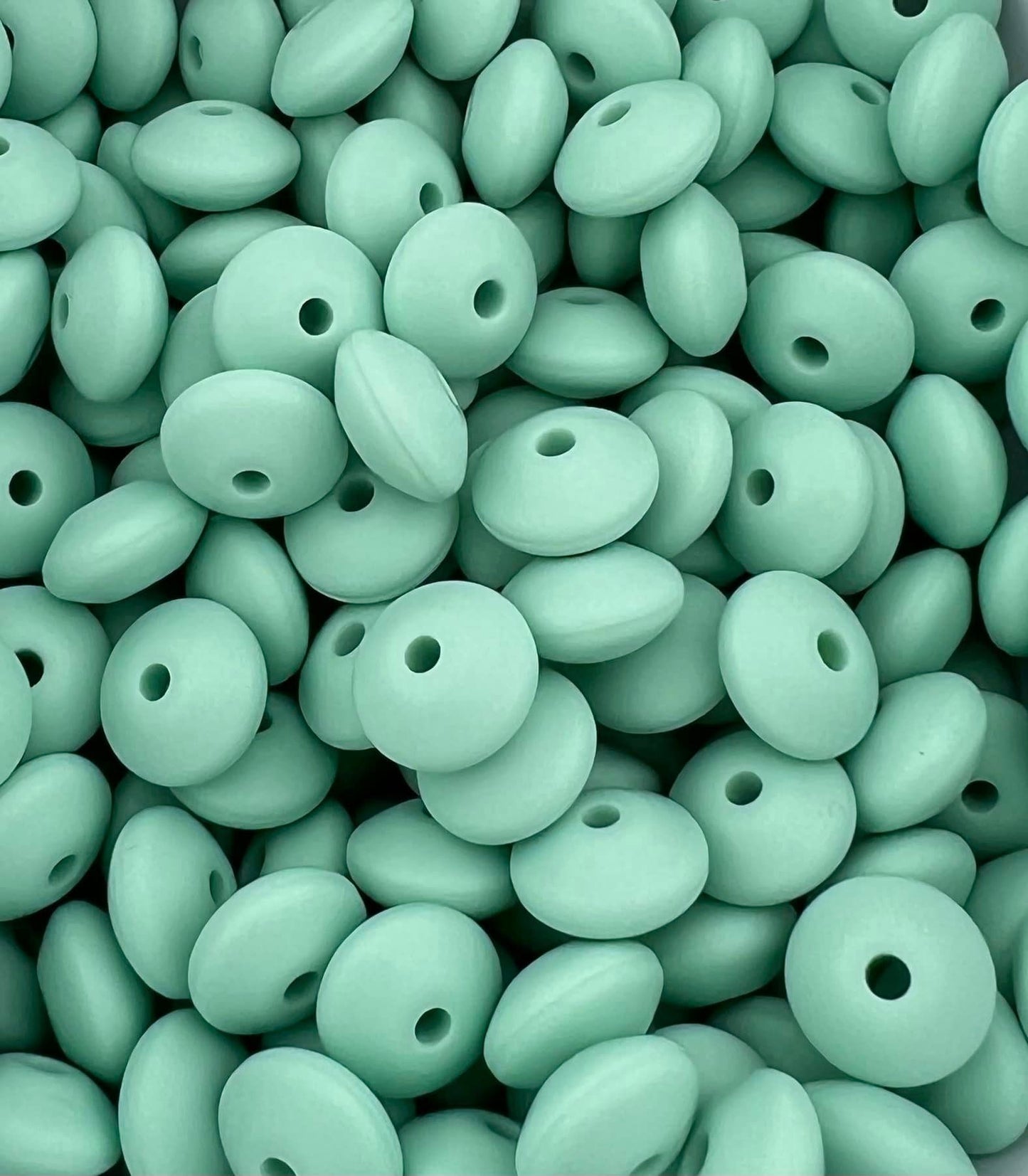 Bag of 100 12mm Tea Green Solid Silicone Lentil Beads