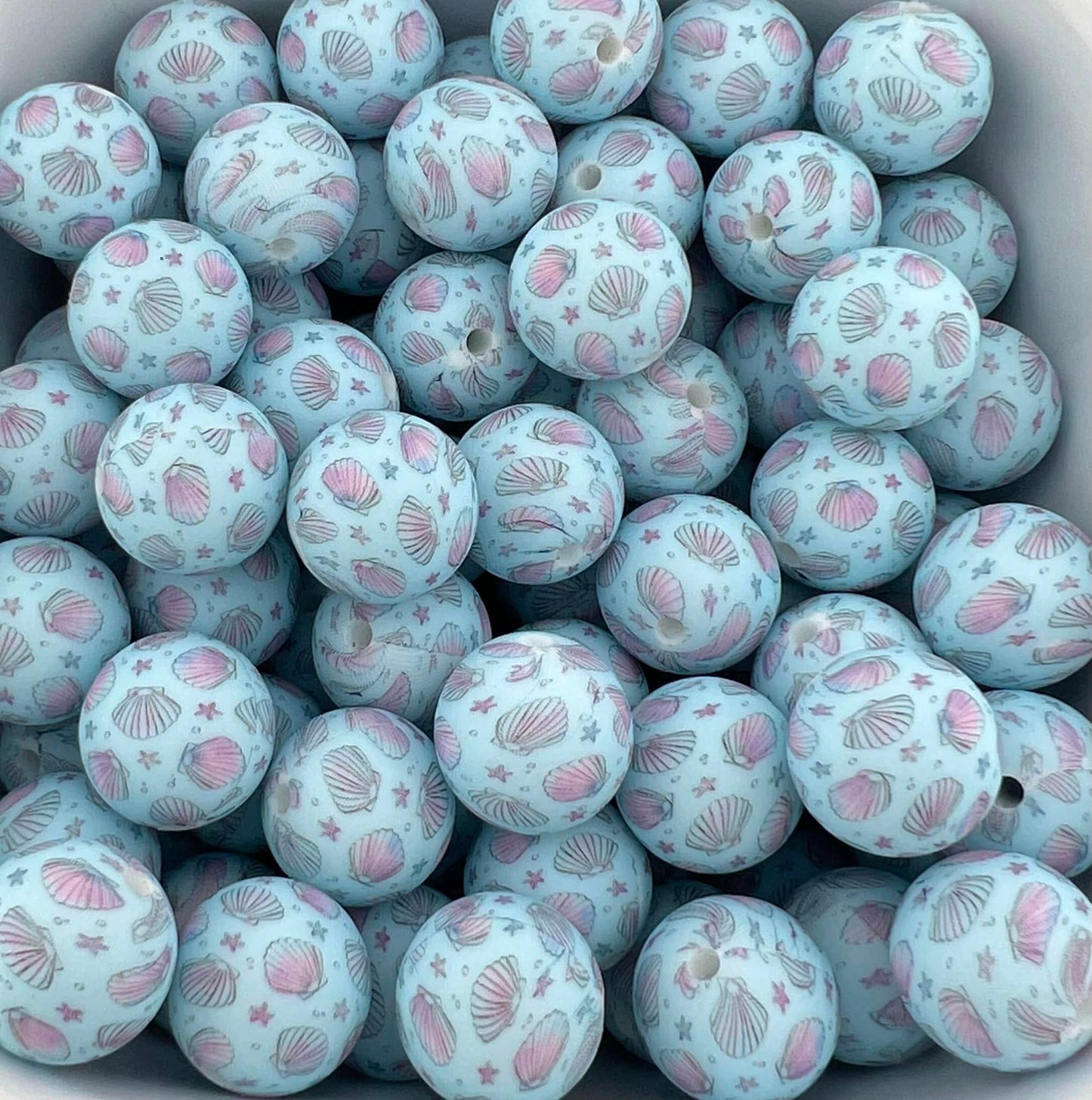 Pack of 70 15MM Pink Seashells on Blue beads