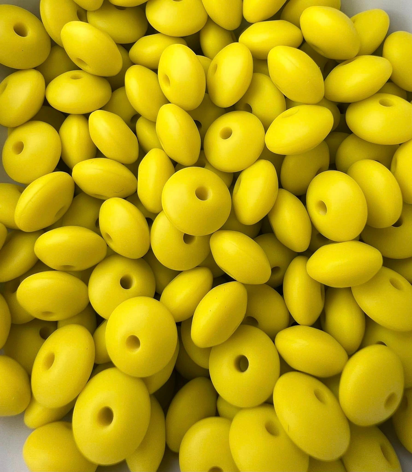 Bag of 100 12mm Happy Yellow Solid Silicone Lentil Beads