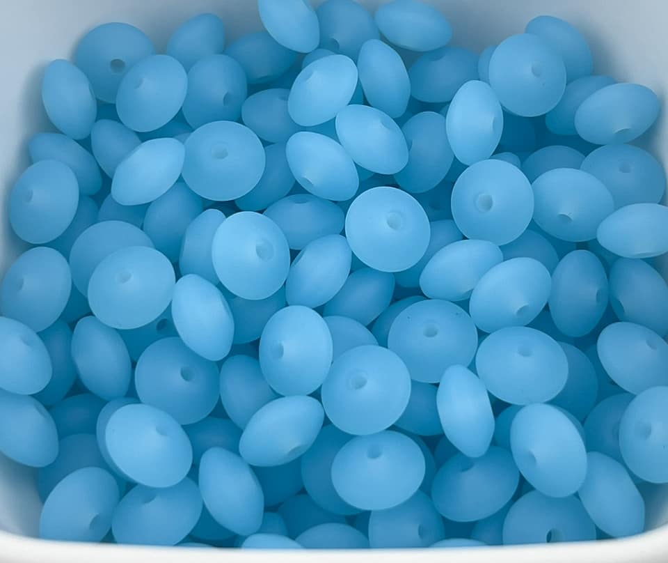 Bag of 100 12mm Clear Blue Solid Silicone Lentil Beads