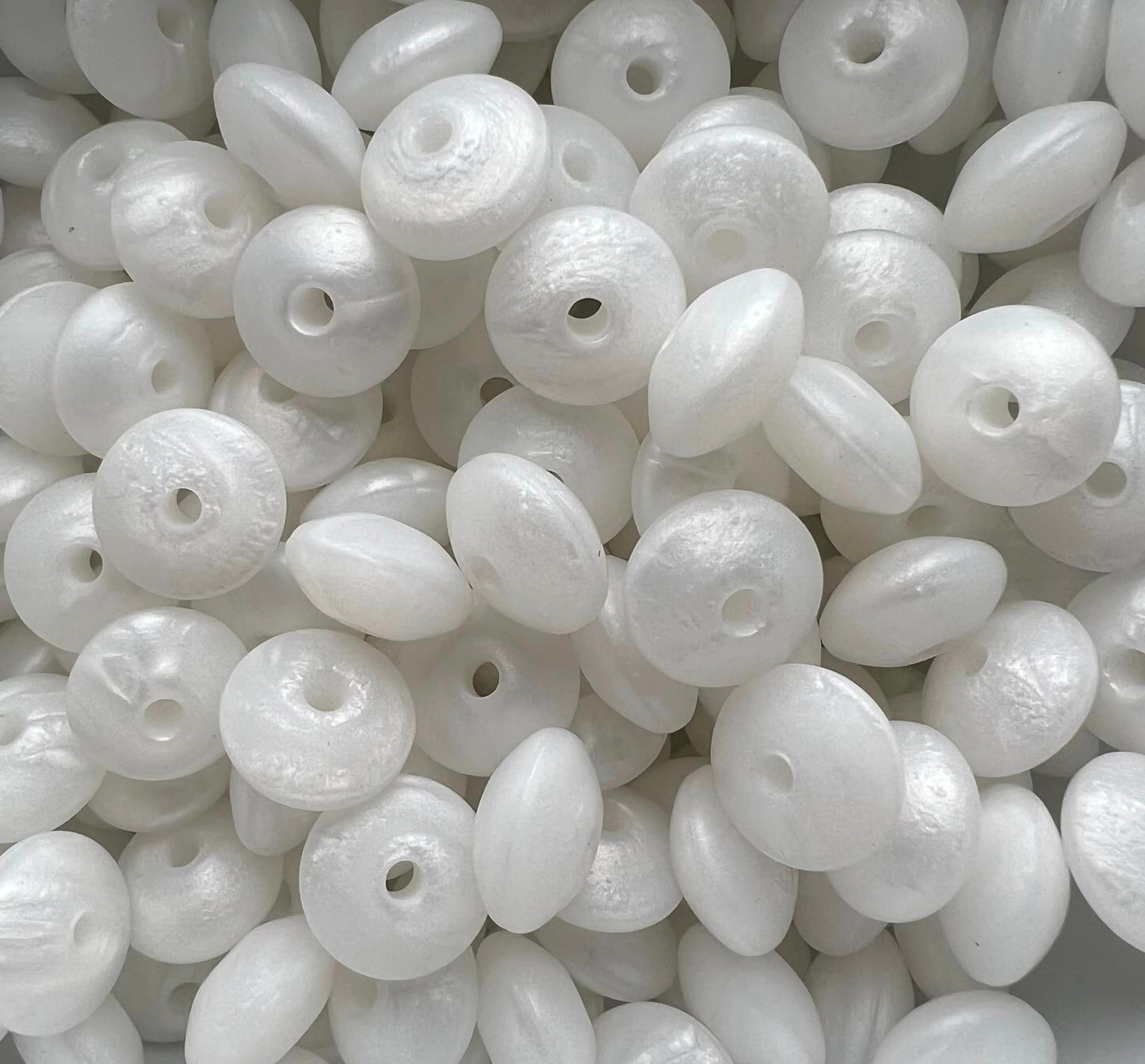 Bag of 100 12mm White Pearl Solid Silicone Lentil Beads