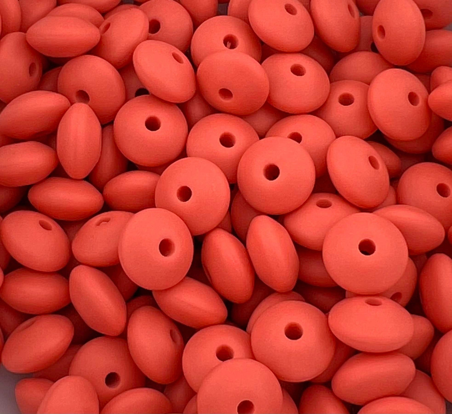 Bag of 100 12mm Coral Solid Silicone Lentil Beads