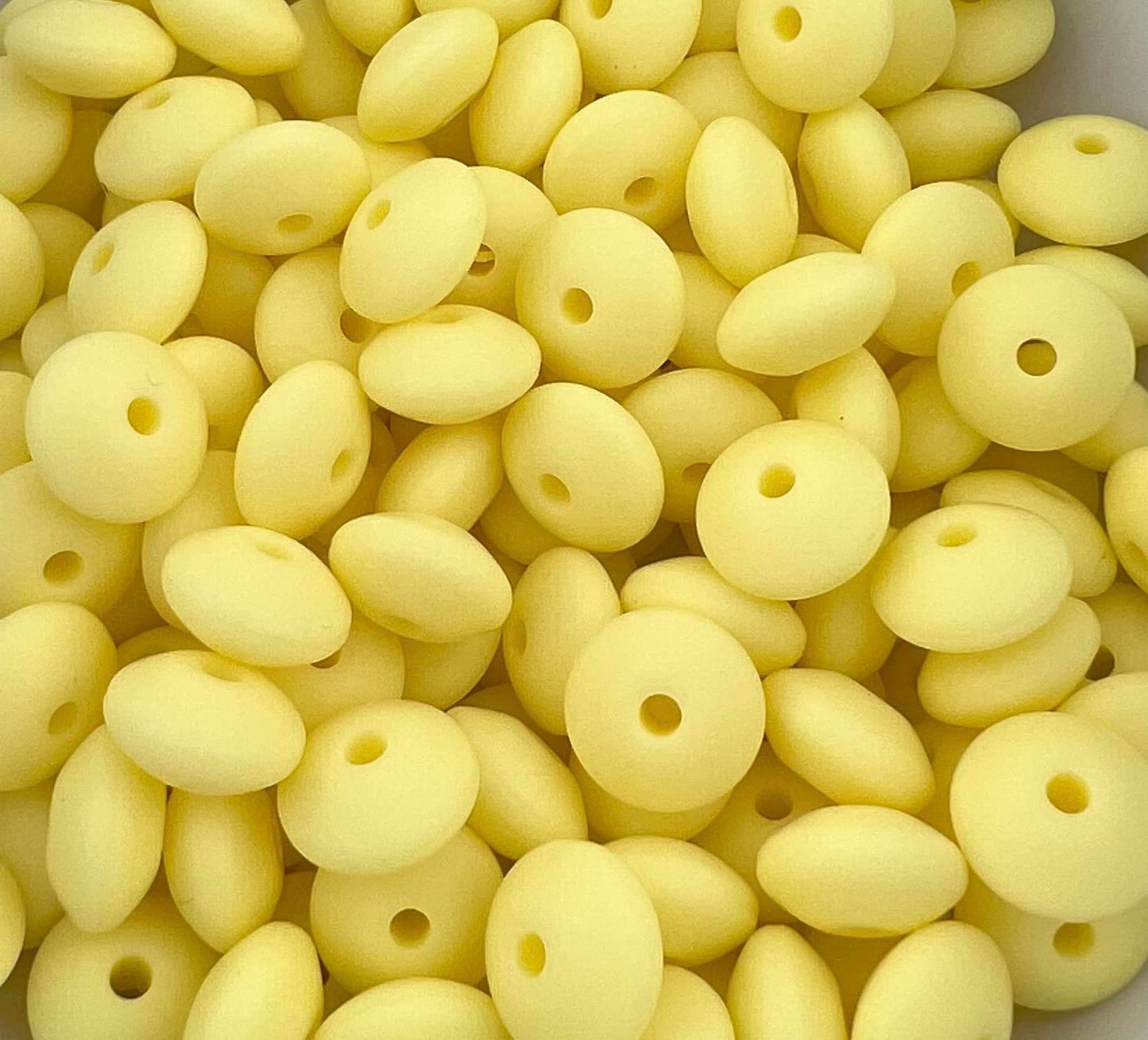 Bag of 100 12mm Baby Yellow Solid Silicone Lentil Beads
